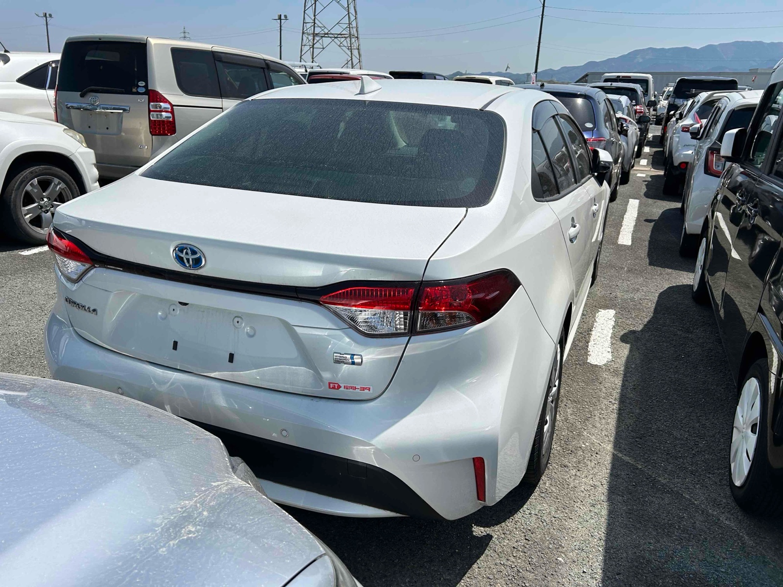 2023 TOYOTA COROLLA 4 auction-graded Japanese used car for sale export to United Kingdom 