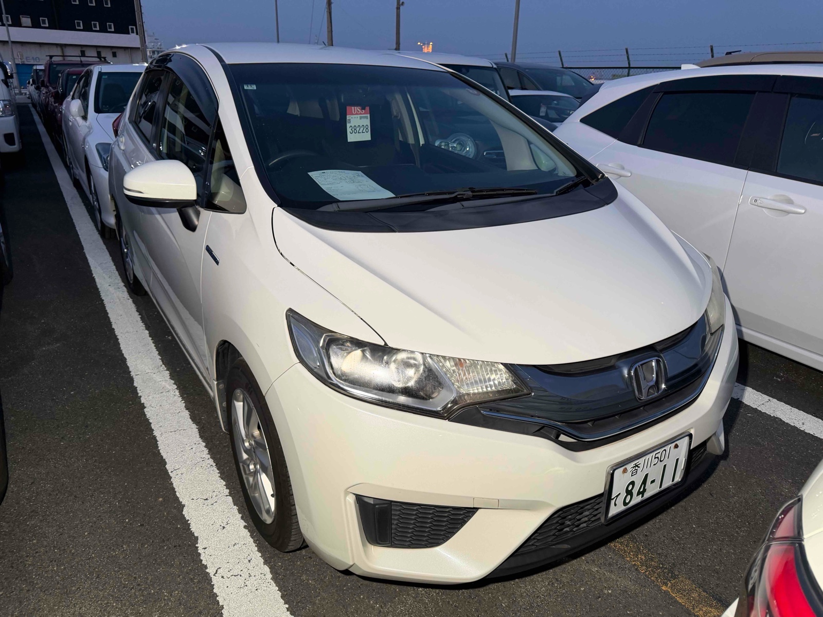 2014 HONDA FIT 4 auction-graded Japanese used car for sale export to United Kingdom 