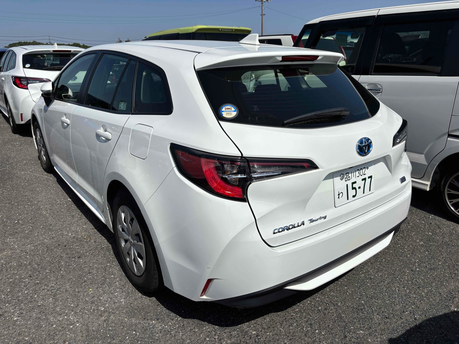 2023 TOYOTA COROLLA TOURING 4 auction-graded Japanese used car for sale export to United Kingdom 
