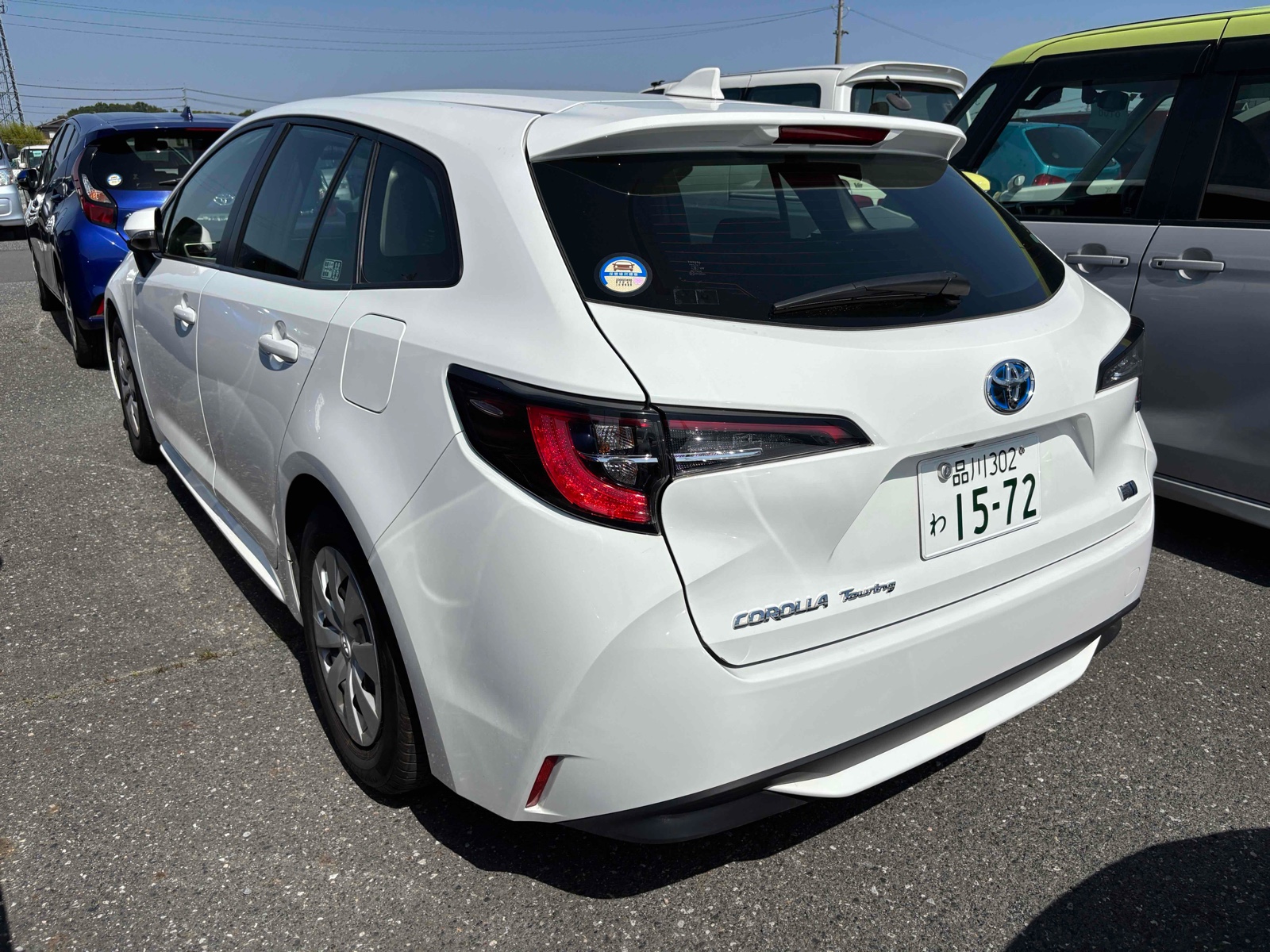 2023 TOYOTA COROLLA TOURING 4 auction-graded Japanese used car for sale export to United Kingdom 