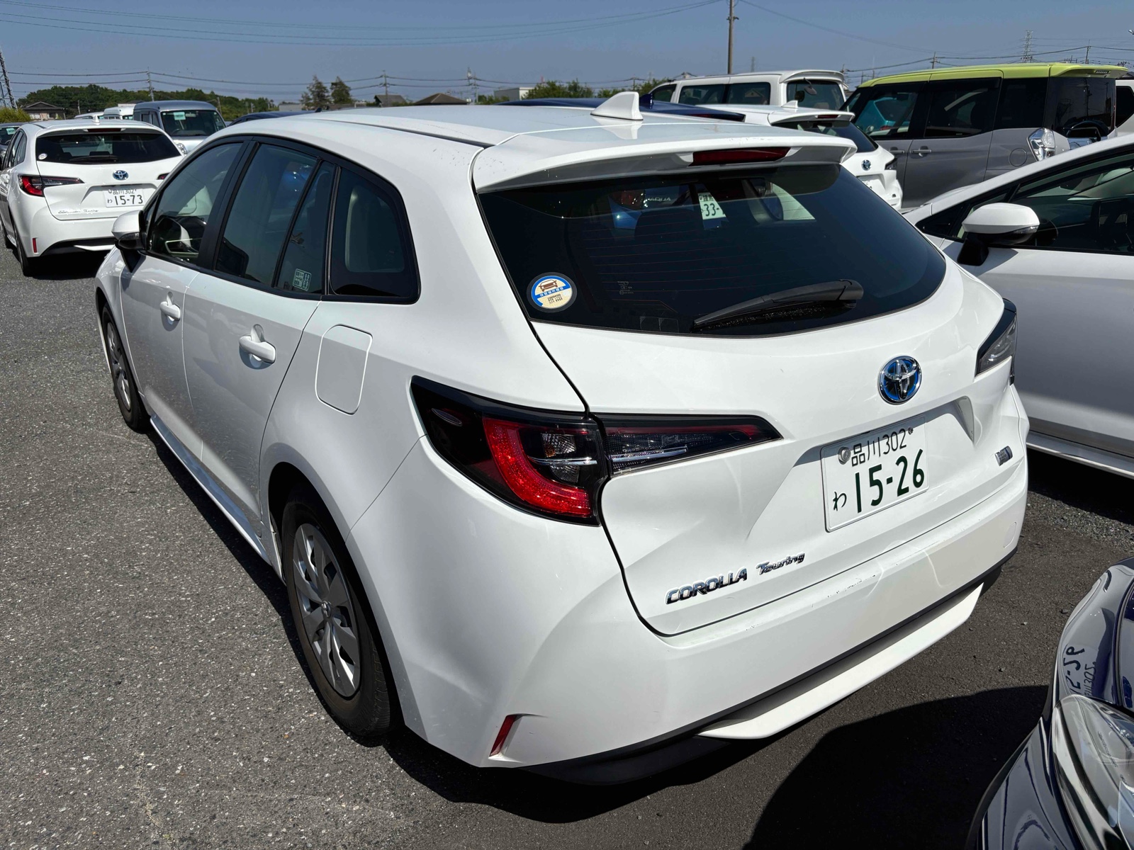 2023 TOYOTA COROLLA TOURING 4 auction-graded Japanese used car for sale export to United Kingdom 