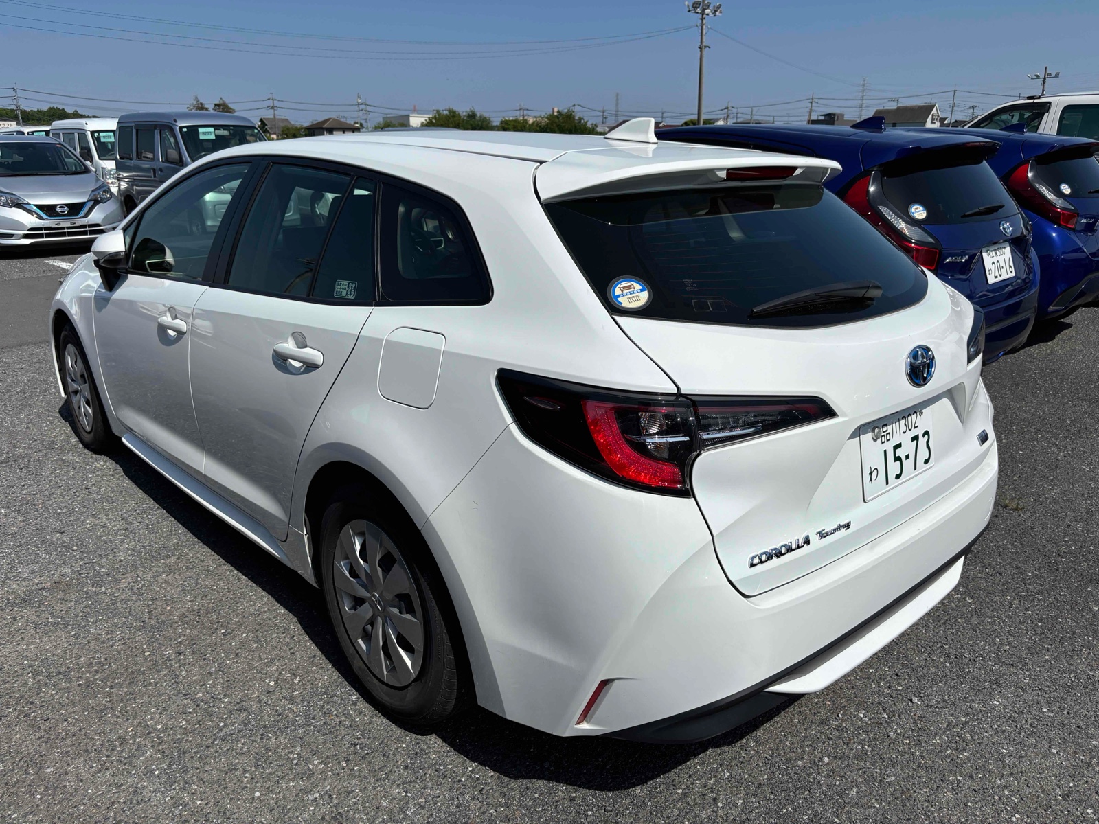 2023 TOYOTA COROLLA TOURING 3.5 auction-graded Japanese used car for sale export to United Kingdom 