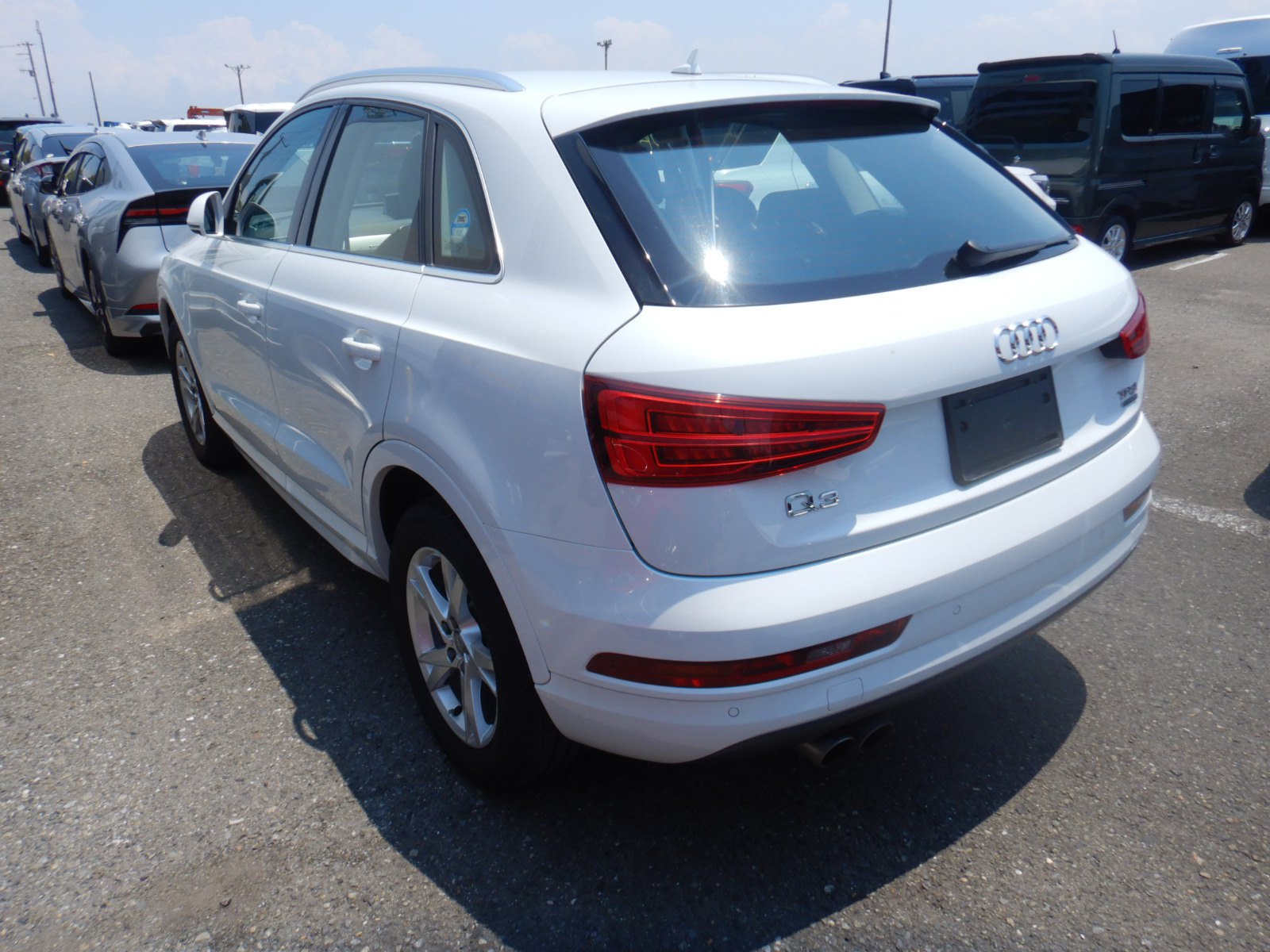 2015 AUDI Q3 4WD 4 auction-graded Japanese used car for sale export to United Kingdom 