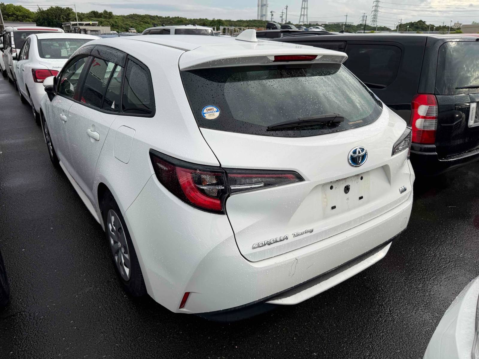2021 TOYOTA COROLLA TOURING 3.5 auction-graded Japanese used car for sale export to United Kingdom 