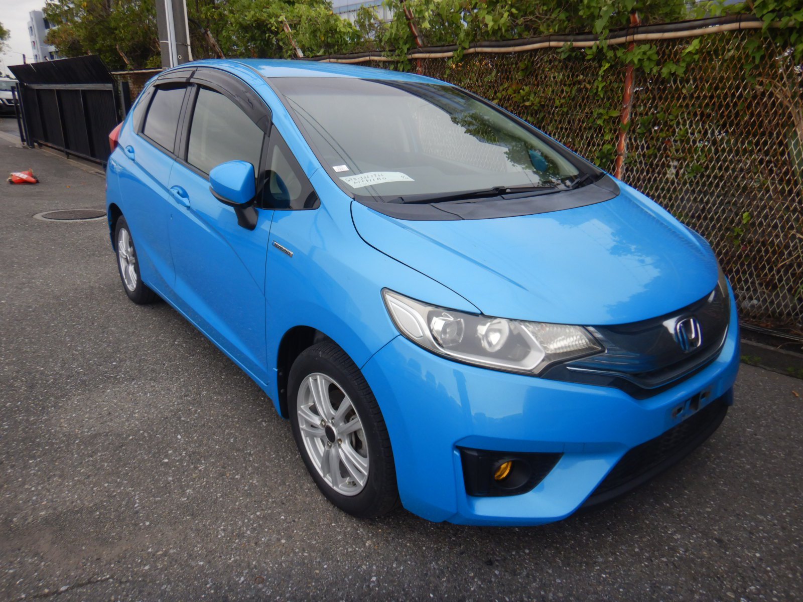 2014 HONDA FIT 4 auction-graded Japanese used car for sale export to United Kingdom 