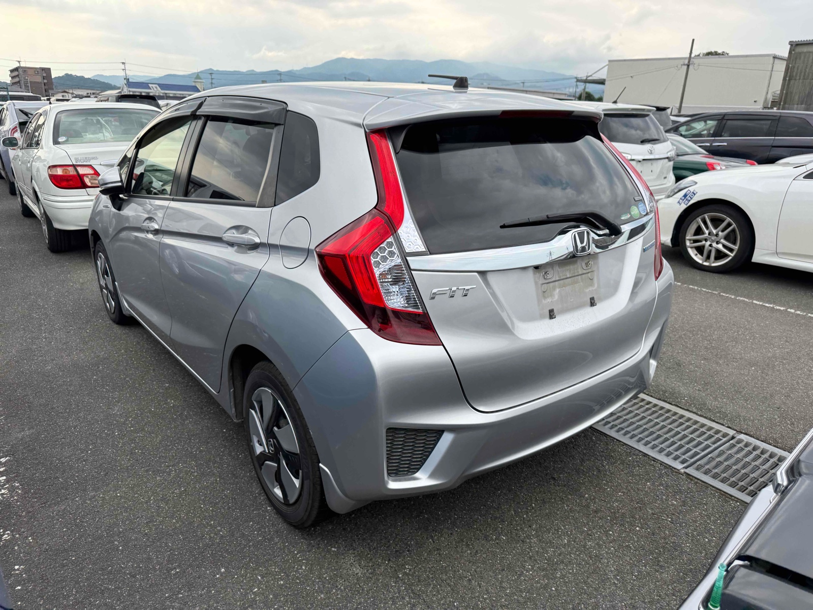 2013 HONDA FIT 4 auction-graded Japanese used car for sale export to United Kingdom 