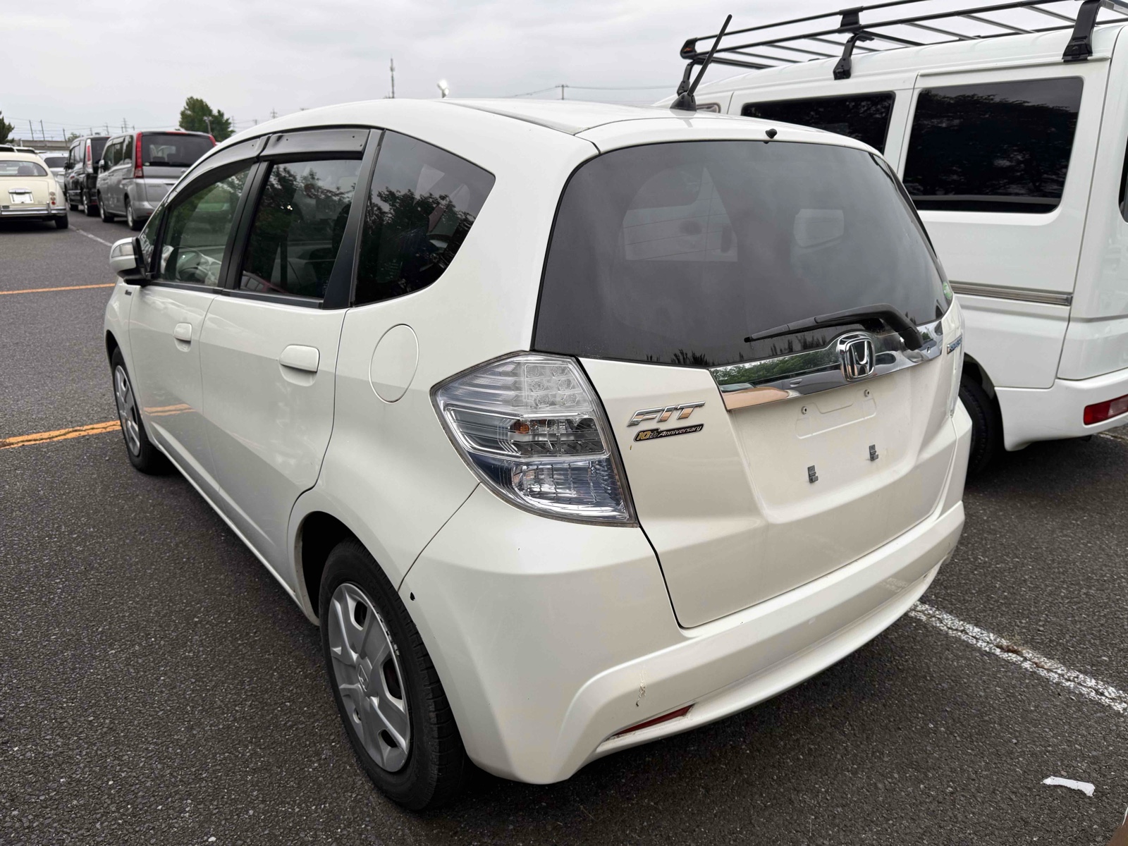 2012 HONDA FIT 3.5 auction-graded Japanese used car for sale export to United Kingdom 