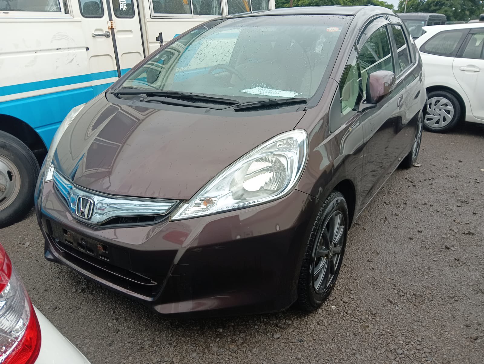 2011 HONDA FIT 4 auction-graded Japanese used car for sale export to United Kingdom 