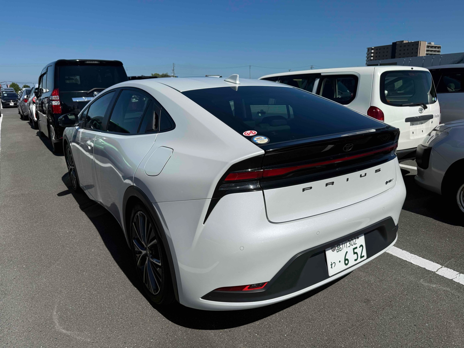2023 TOYOTA PRIUS 4 auction-graded Japanese used car for sale export to United Kingdom 