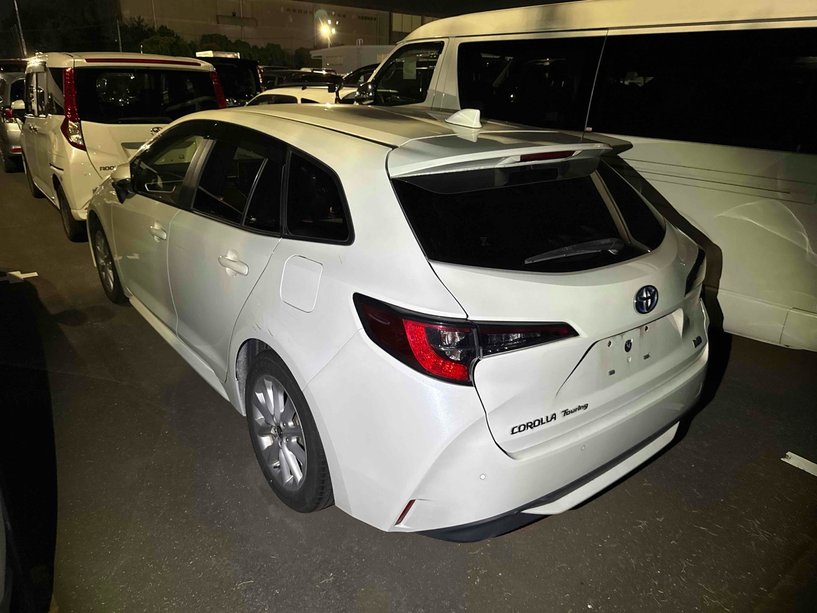 2021 TOYOTA COROLLA TOURING R auction-graded Japanese used car for sale export to United Kingdom 