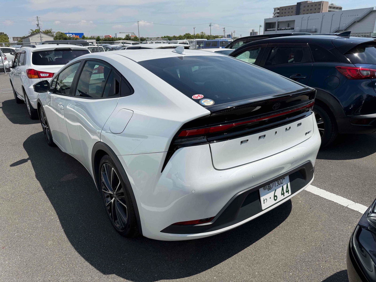 2023 TOYOTA PRIUS 4 auction-graded Japanese used car for sale export to United Kingdom 