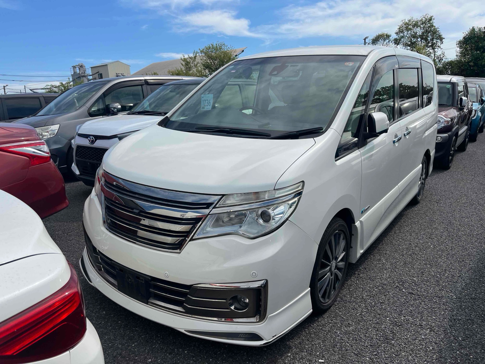 2014 NISSAN SERENA 4 auction-graded Japanese used car for sale export to United Kingdom 
