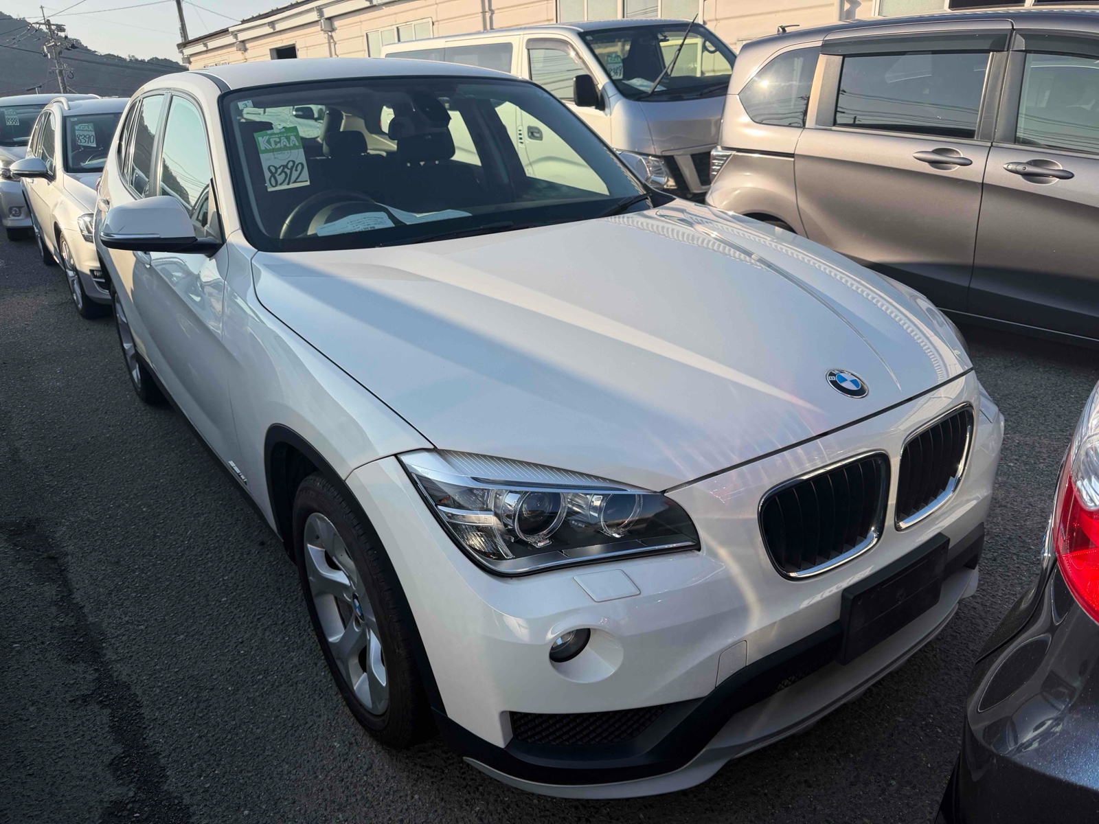 2015 BMW X1 4 auction-graded Japanese used car for sale export to United Kingdom 