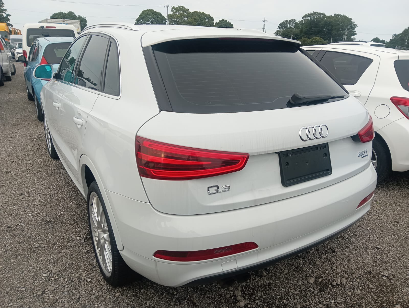 2013 AUDI Q3 4WD 4 auction-graded Japanese used car for sale export to United Kingdom 