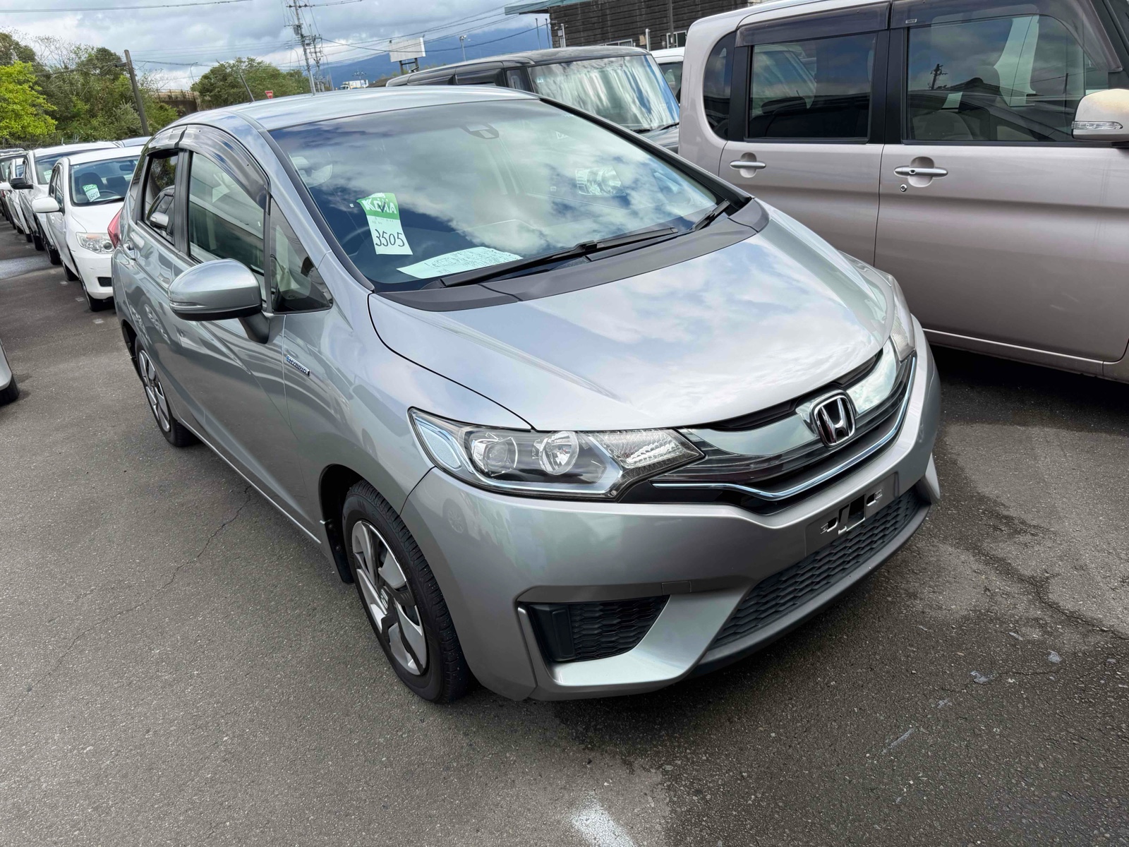 2015 HONDA FIT 4 auction-graded Japanese used car for sale export to United Kingdom 
