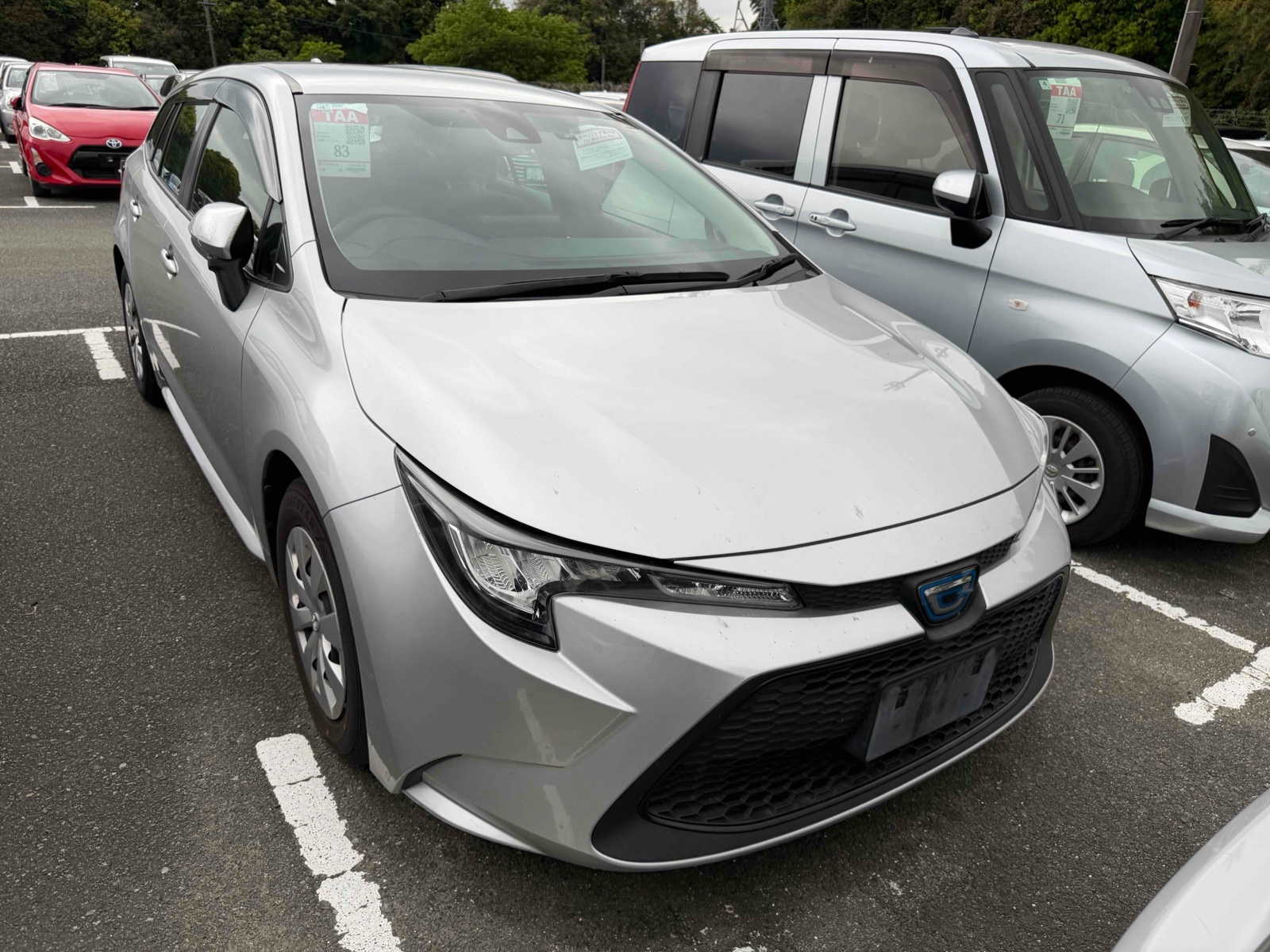 2021 TOYOTA COROLLA TOURING 3.5 auction-graded Japanese used car for sale export to United Kingdom 