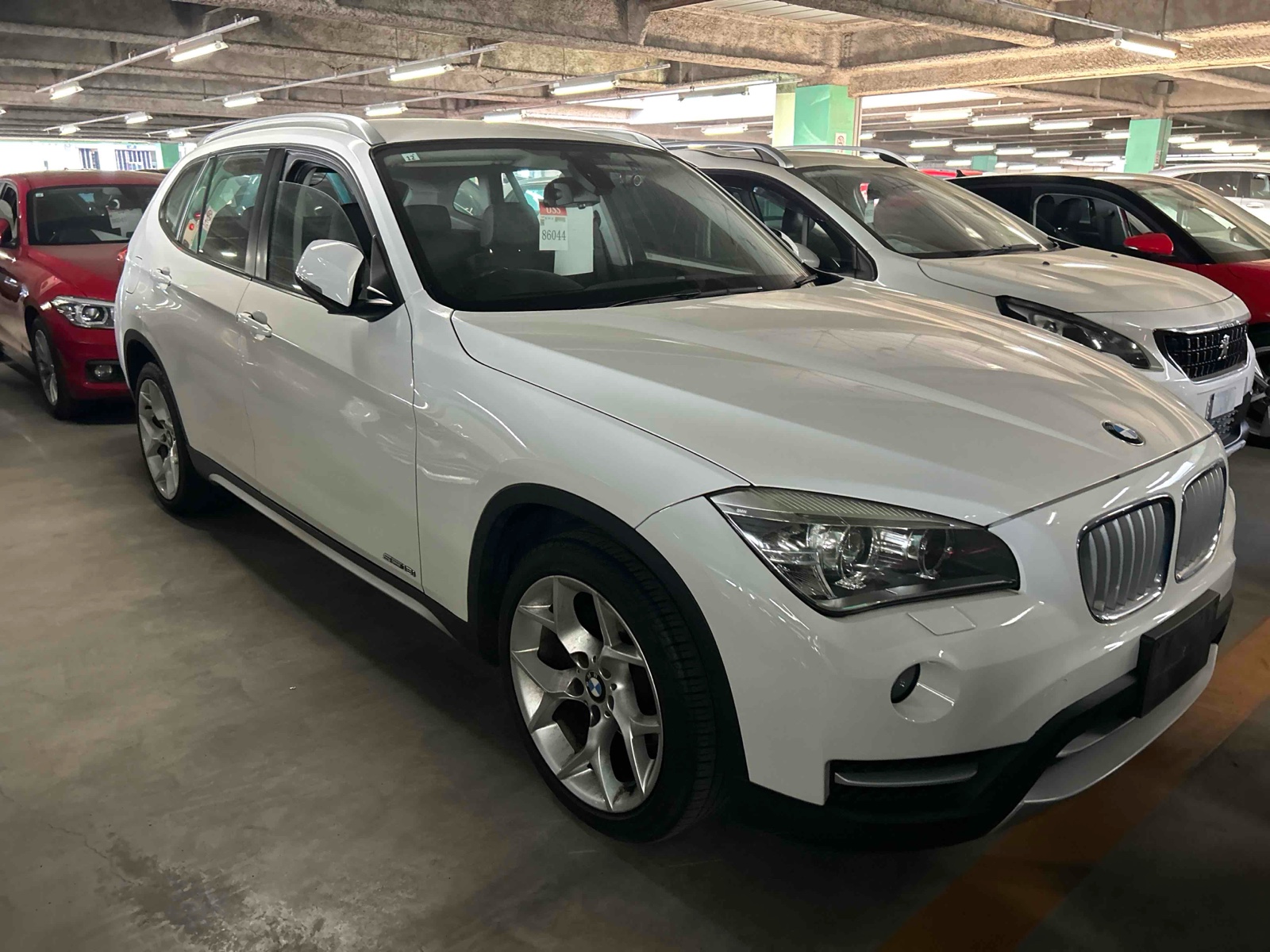 2013 BMW X1 4 auction-graded Japanese used car for sale export to United Kingdom 