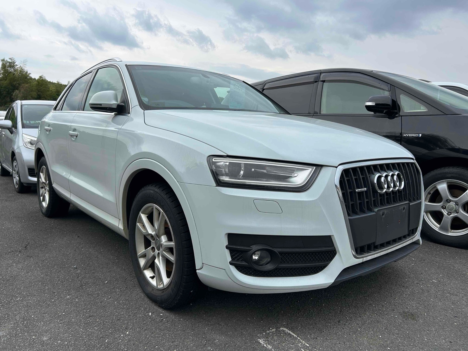 2013 AUDI Q3 4 auction-graded Japanese used car for sale export to United Kingdom 