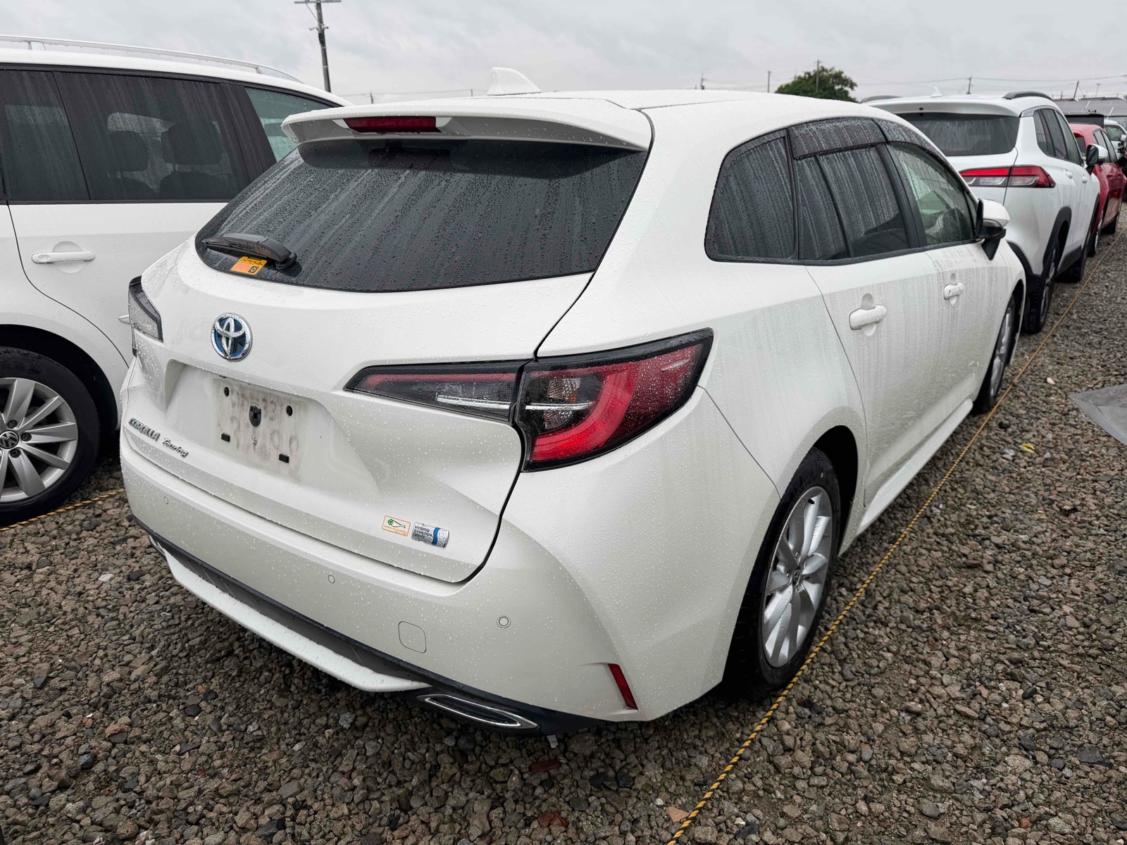 2021 TOYOTA COROLLA TOURING 3.5 auction-graded Japanese used car for sale export to United Kingdom 