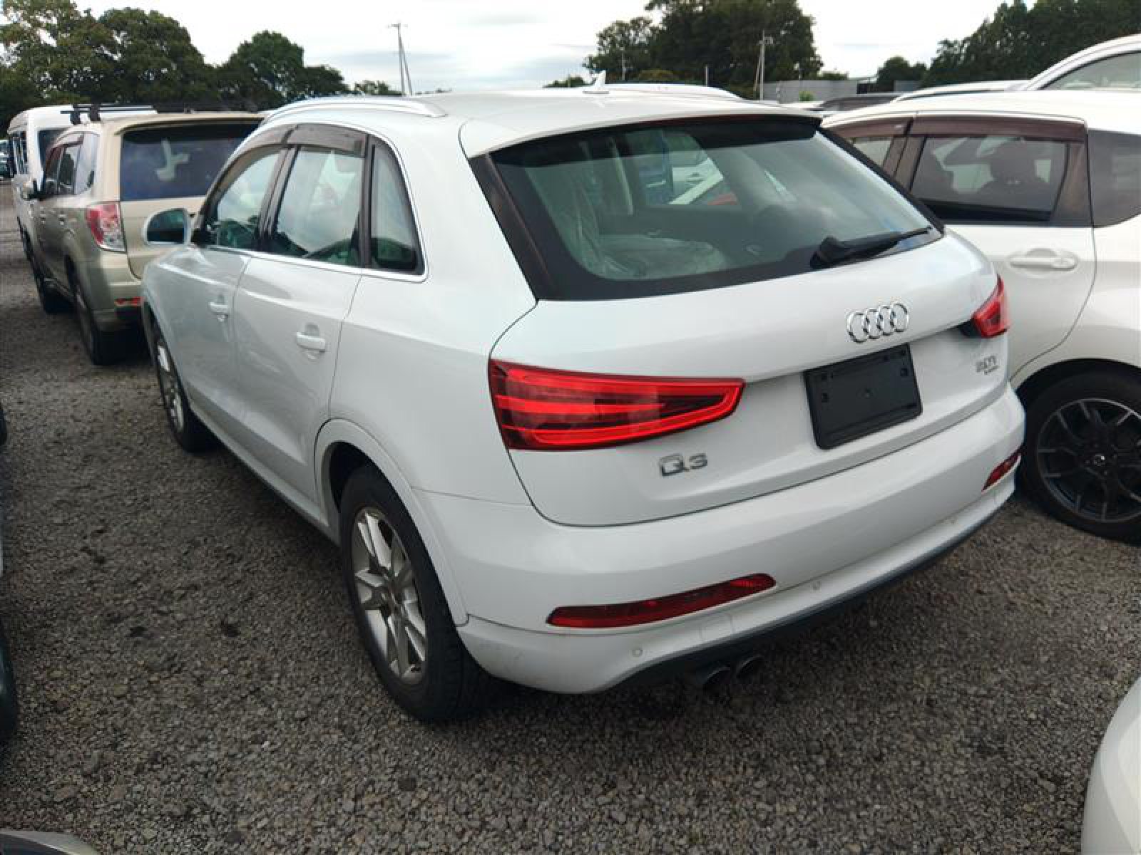 2013 AUDI Q3 4WD 4 auction-graded Japanese used car for sale export to United Kingdom 