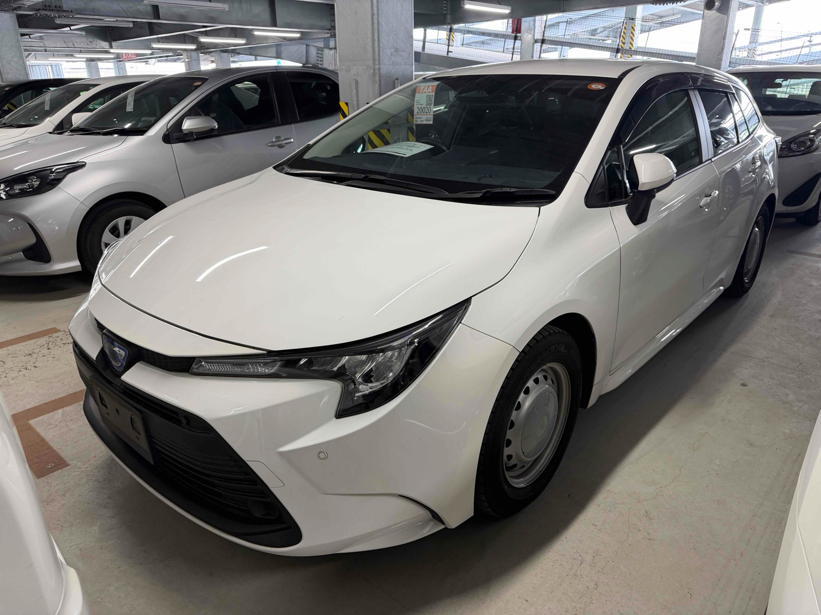 2023 TOYOTA COROLLA TOURING 4 auction-graded Japanese used car for sale export to United Kingdom 