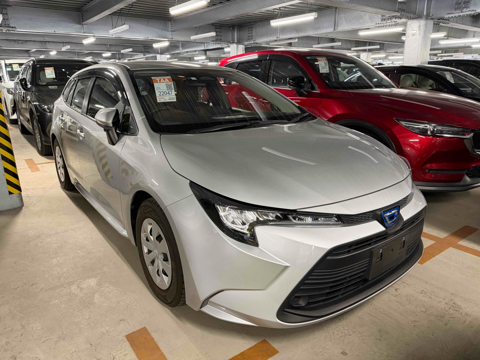 2023 TOYOTA COROLLA TOURING 4 auction-graded Japanese used car for sale export to United Kingdom 