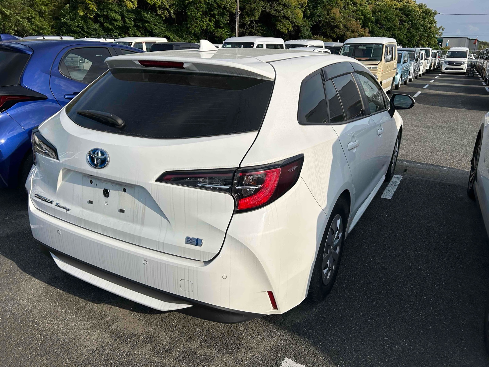 2023 TOYOTA COROLLA RA auction-graded Japanese used car for sale export to United Kingdom 