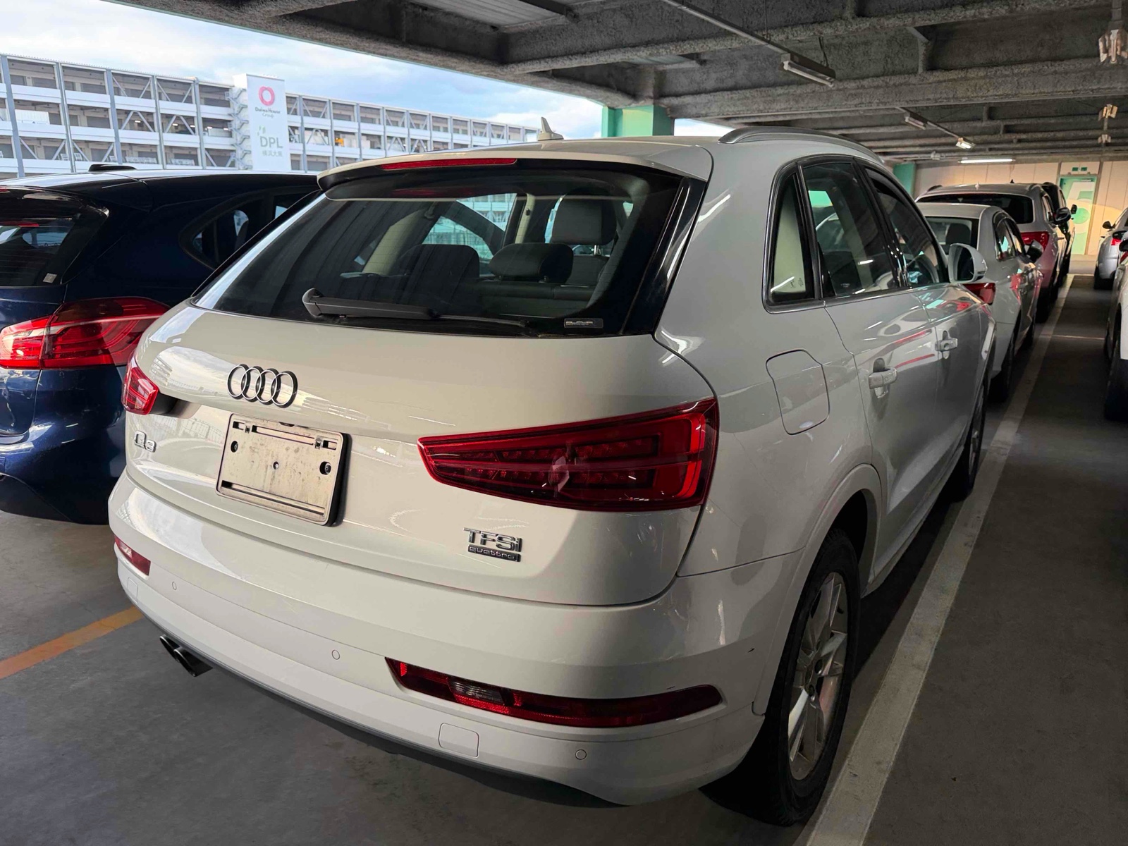 2015 AUDI Q3 4WD 4 auction-graded Japanese used car for sale export to United Kingdom 